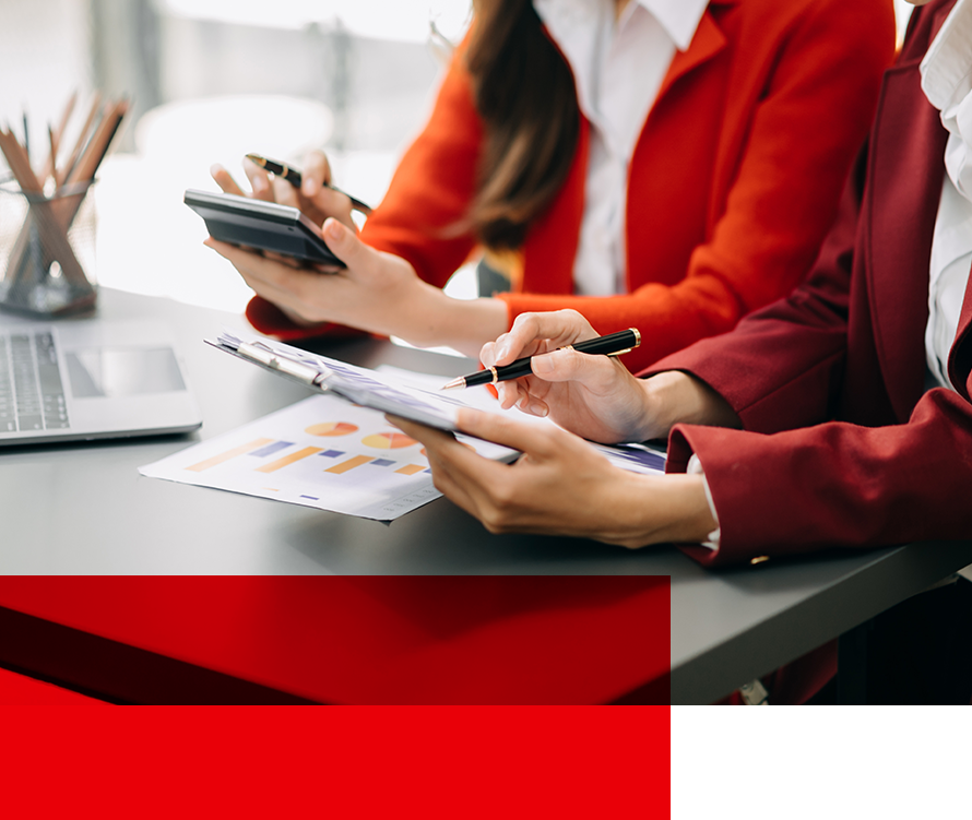 Invenio employees sitting at a desk